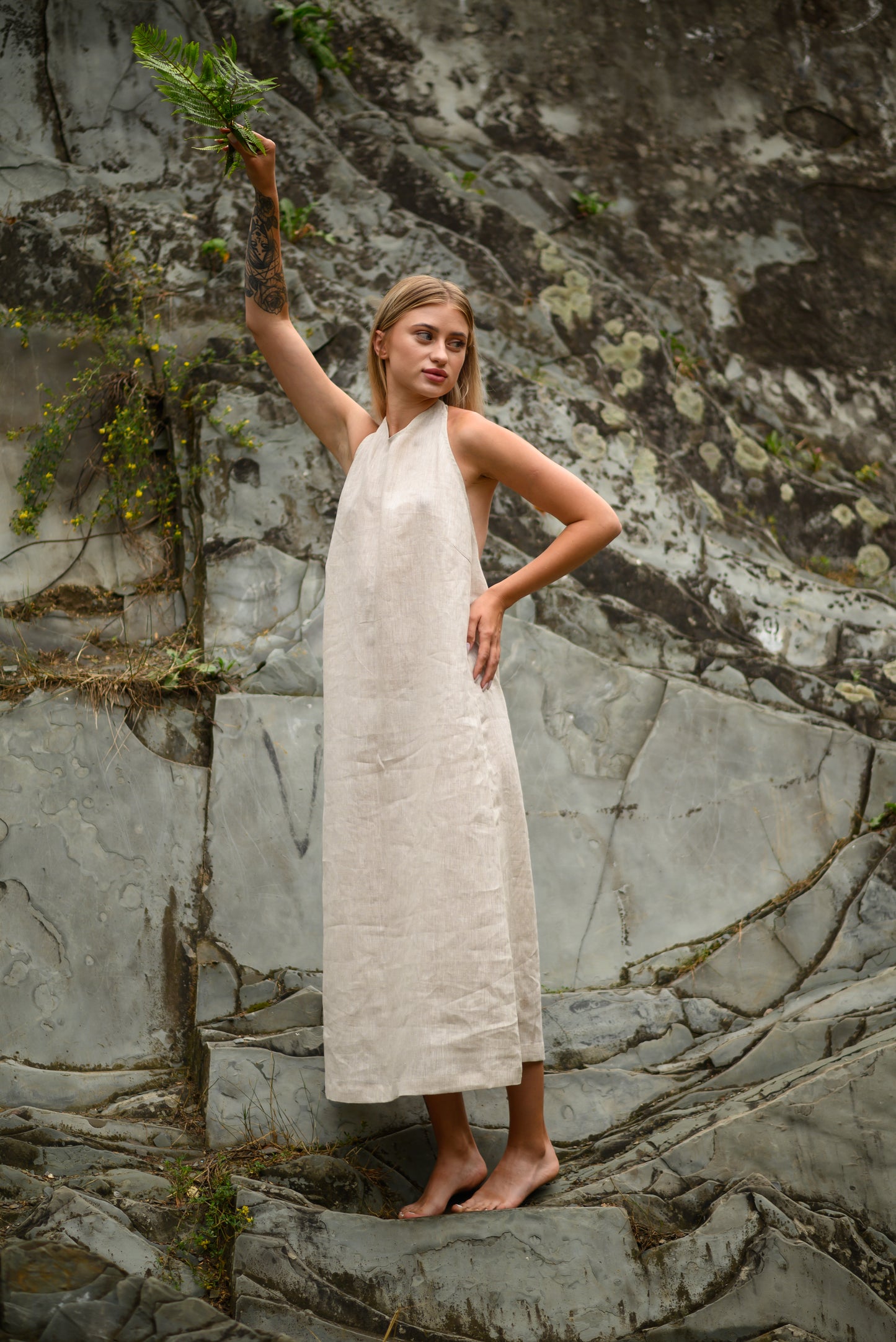 Women's dress with an open back made of natural linen